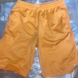 Orange boys shorts with drawstring size 14